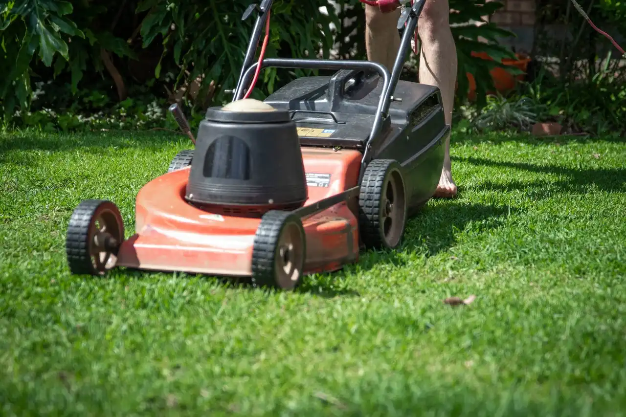 Operating a mower on grass