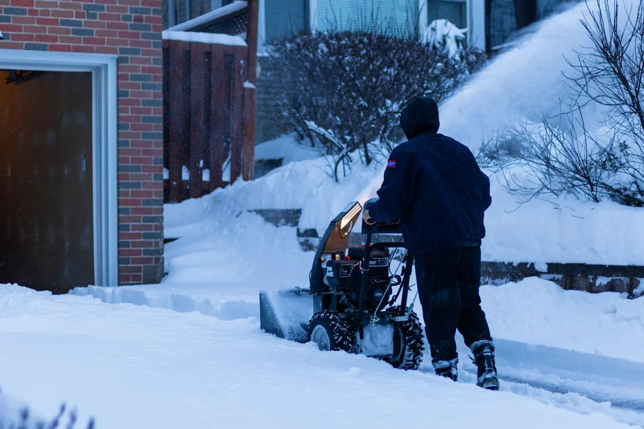 Snow blower on a sidewalk