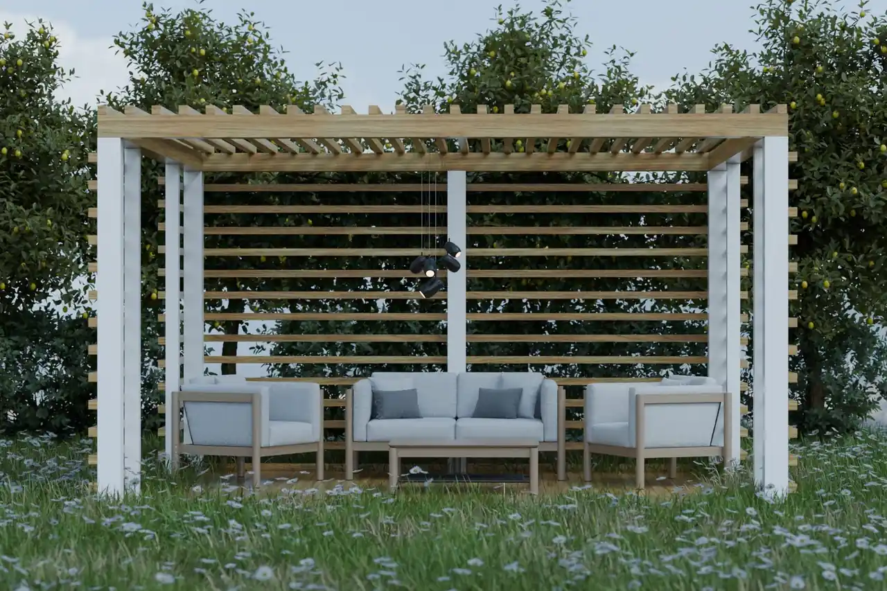 An outdoor living space with a pergola and seating in a landscaped garden